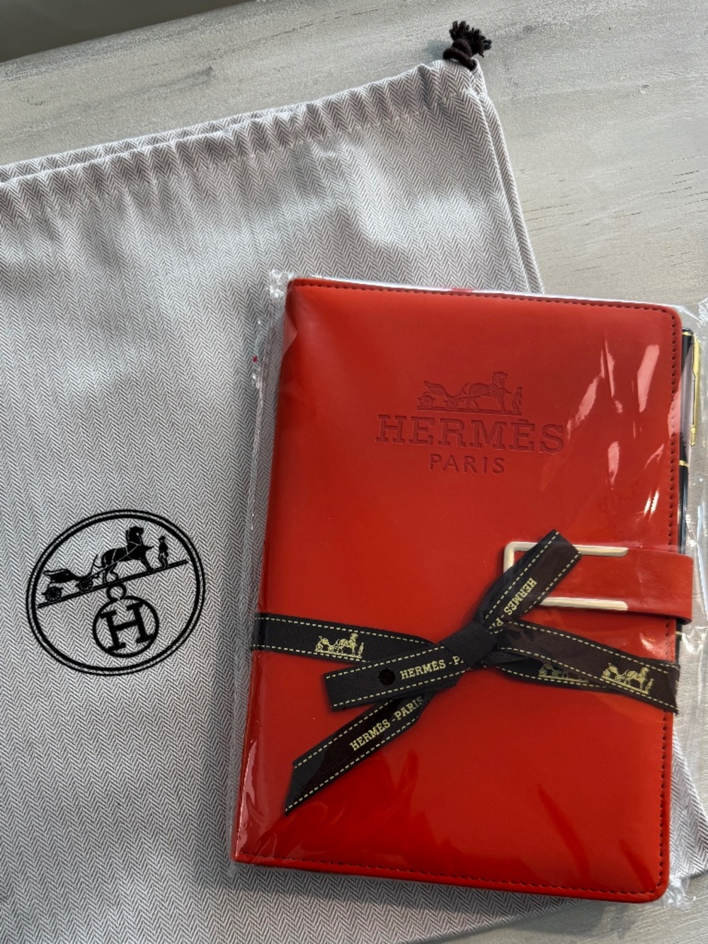 Hermes Orange notebook with pen. Bonus dustbag!